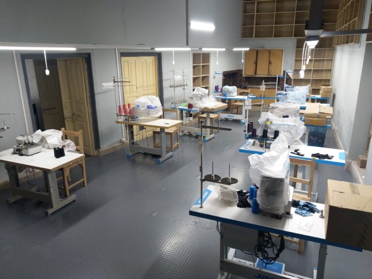 GYMHUR sportswear manufacturing machine hall in Sialkot, Pakistan
